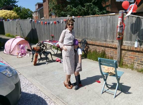 Gina Penn and husband Nigel with twins Sasha and Scarlet celebrating VE Day in St Mary's Close, Littlehampton