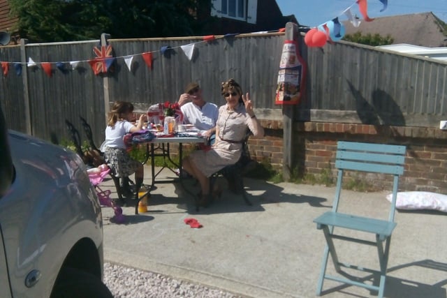 Gina Penn and husband Nigel with twins Sasha and Scarlet celebrating VE Day in St Mary's Close, Littlehampton