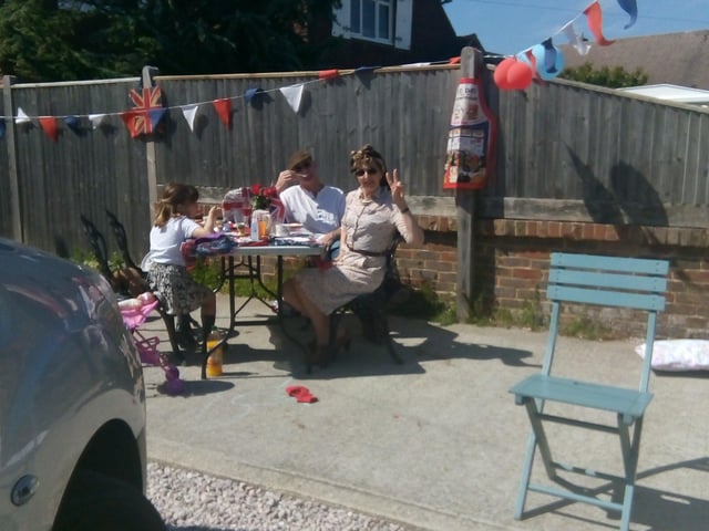 Gina Penn and husband Nigel with twins Sasha and Scarlet celebrating VE Day in St Mary's Close, Littlehampton