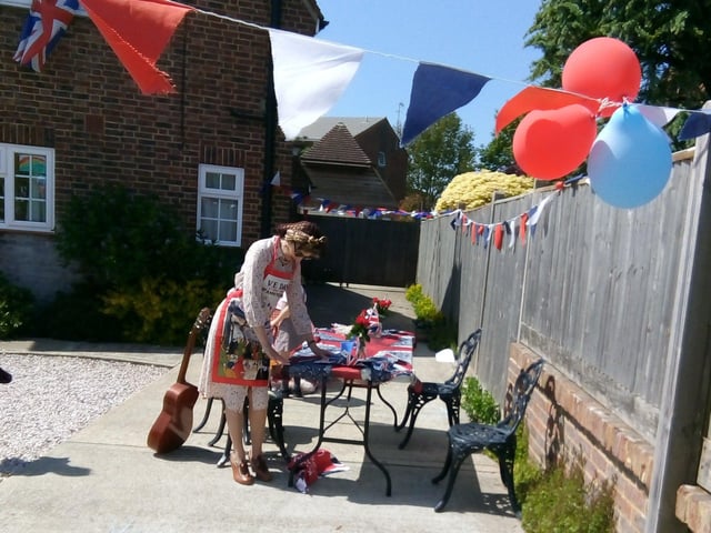 Gina Penn and husband Nigel with twins Sasha and Scarlet celebrating VE Day in St Mary's Close, Littlehampton