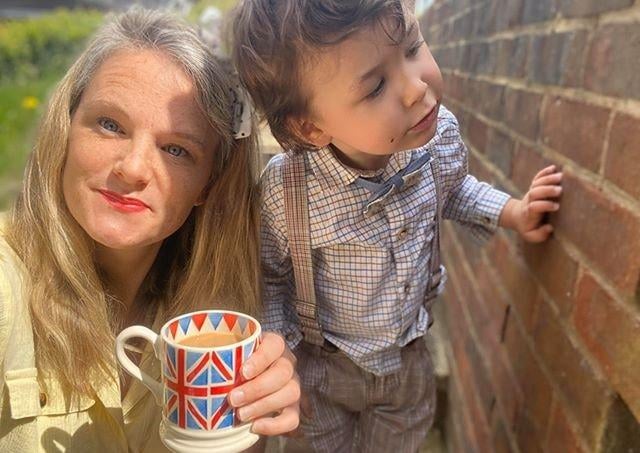 Lotte Francis and her two-year-old son Winston  dressed up and celebrated VE Day with a hand-delivered afternoon tea from Tory’s Cafe in the Park and flag making, complete with socially-distanced street party with the Edward Road residents. SUS-201105-114526001