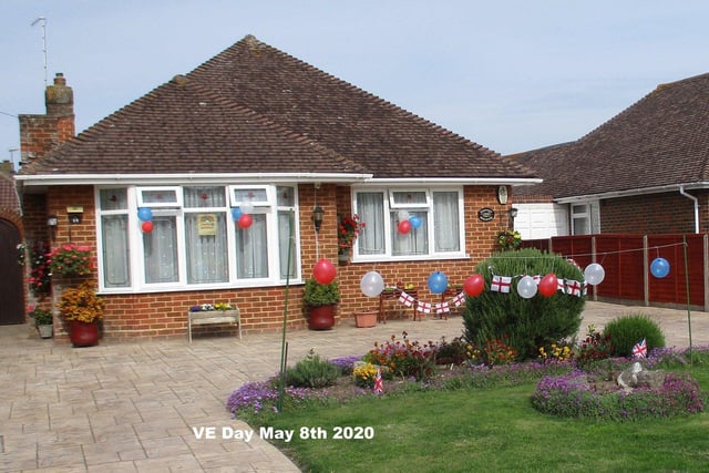 Many of the bungalows in The Ridings, East Preston, were decorated with flags, bunting and balloons