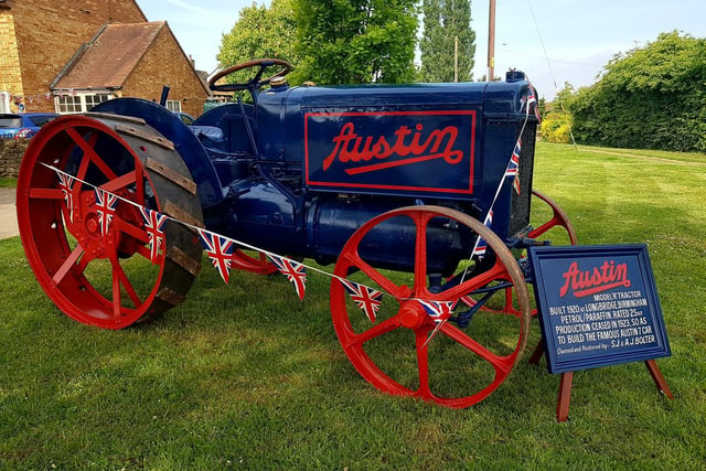 The Bolter family's Austin model R tractor which is 100 years old this year celebrating VE Day on the village green in Tysoe