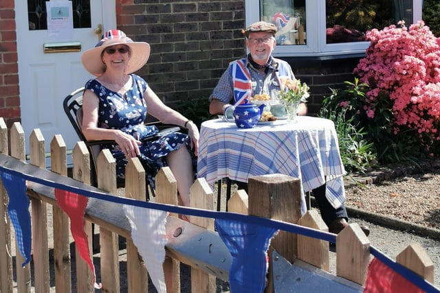Liz Brewer sent this picture of her neighbours Bob and Barbara Mellish celebrating the anniversary at their home in Handcross SUS-201105-150801001