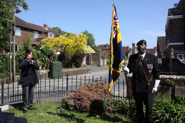 VE Day in Uckfield. At Holy Cross Church Uckfield Ray Martin  played the last post and reveille plus a great version of "Over the Rainbow " for the Carers and the NHS., Eric Senior from British Legion was the Standard Bearer. Picture by Ron Hill. SUS-201105-131252001