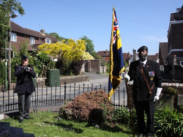VE Day in Uckfield. At Holy Cross Church Uckfield Ray Martin played the last post and reveille plus a great version of "Over the Rainbow " for the Carers and the NHS., Eric Senior from British Legion was the Standard Bearer. Picture by Ron Hill. SUS-201105-131252001