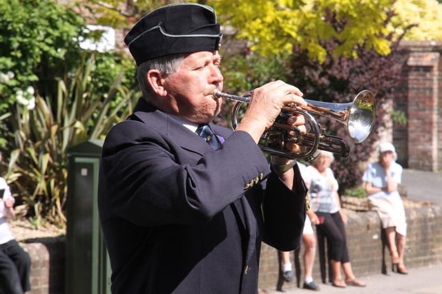 VE Day in Uckfield. At Holy Cross Church Uckfield Ray Martin  played the last post and reveille plus a great version of "Over the Rainbow " for the Carers and the NHS., Eric Senior from British Legion was the Standard Bearer. Picture by Ron Hill. SUS-201105-131314001