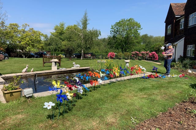 Staff at The Anchorage care home in Pulborough decorated the garden with flowers made from recycled products