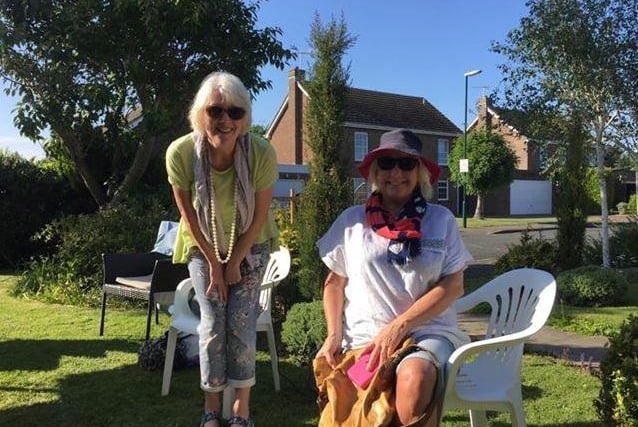 Jane Legg sent in this photo from her VE Day socially distant garden tea party in Aldwick - pictured is Jane with her twin siter Gill