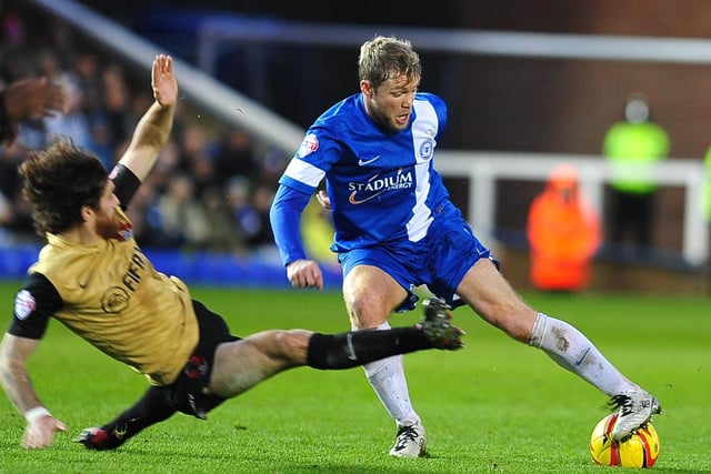 Centre midfield: GRANT McCANN. Country: NORTHERN IRELAND. Outstanding midfielder for Posh making 186 appearances and scoring 35 goals between 2010 and 2015.
