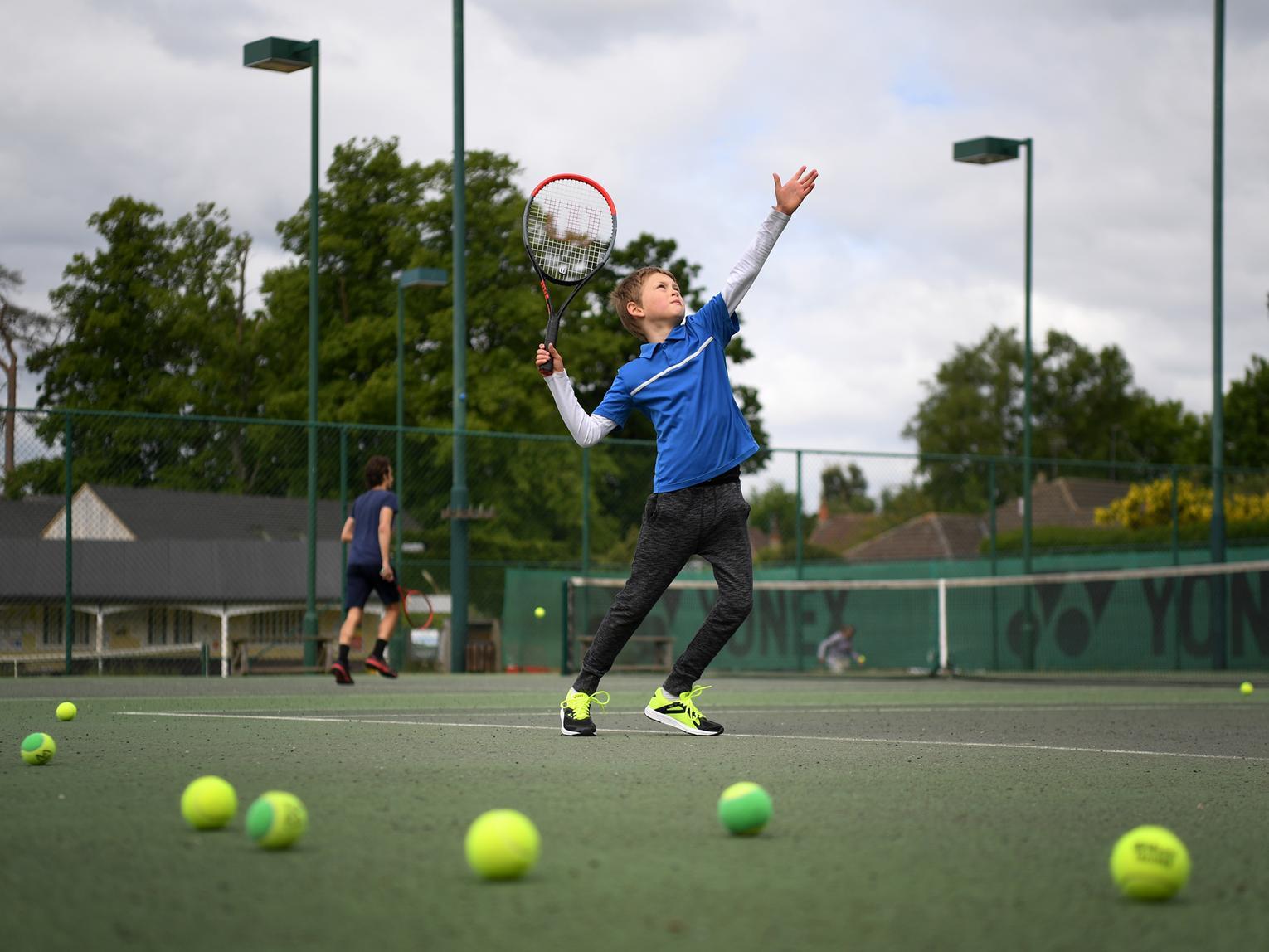 Oskar Lawkowski and his brother, Kacper, returned to playing at Northampton County Lawn Tennis Club on May 13, 2020, in Northampton. Photo by Shaun Botterill/Getty Images