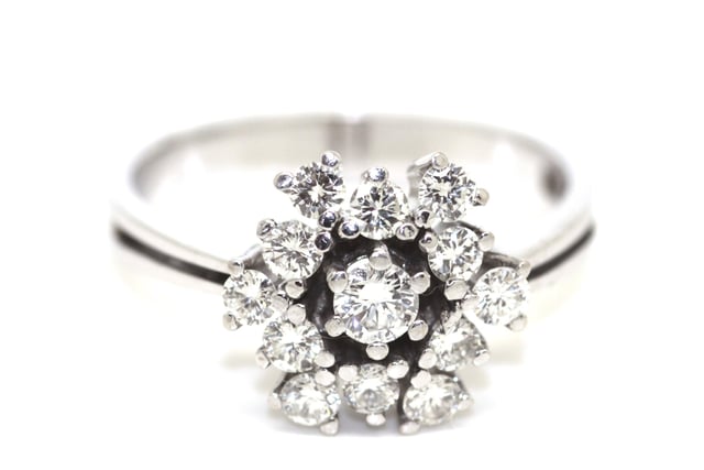 A fabulous 1.2ct diamond cluster ring set in 14k white gold. A beautiful snowflake ring, with diamonds placed alongside and adjacent to each other. £1,850 from Greenstein Antiques