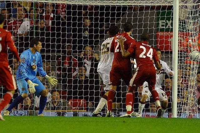 Late heartbreak... David Ngog squeezes home Liverpool's 116th-minute equaliser to make it 2-2
