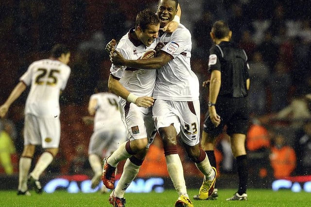 We've done it! Liam Davis and Ryan Gilligan celebrate the Cobblers' victory