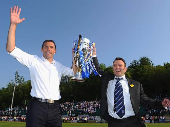 Gus Poyet and Tony Bloom celebrate the League One title and promotion to the Championship