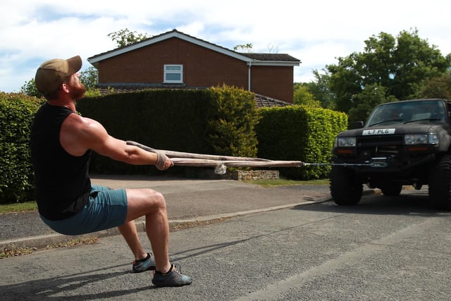 Tom Wood has been using his trucks to build strength