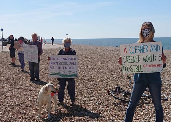 Extinction Rebellion stage protest on Seaford beach