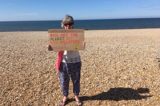 Extinction Rebellion stage protest on Seaford beach