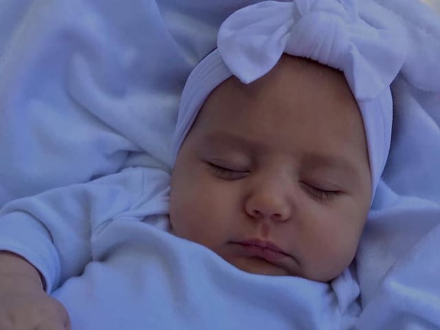 Mia Daisy Belle Moore, born on March 25