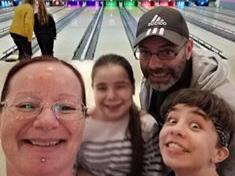 Donna Woodgate bowling with her family