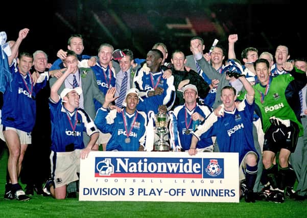 Posh celebrate winning at Wembley in May 2000.