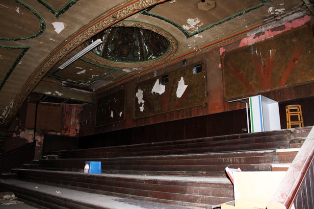 The remnants of the upper circle. The glass hatches on the back wall lead to the projection room.