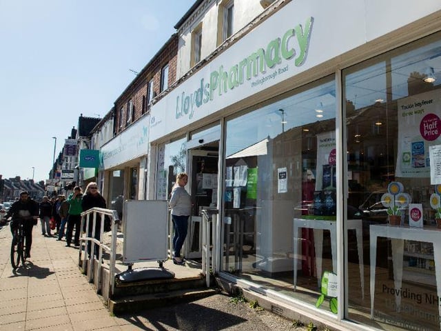 Queuing for the essentials at Lloyds Pharmacy in Wellingborough Road, Northampton