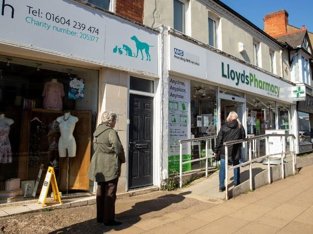 Queuing within social distancing guidelines at Lloyds Pharmacy in Wellingborough Road, Northampton