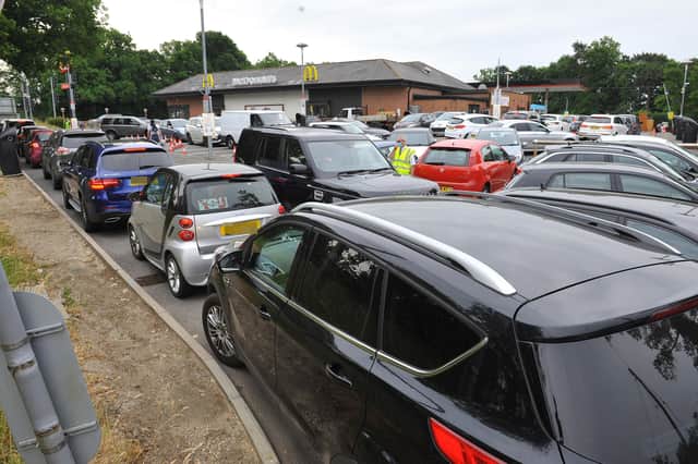 Big queues backing onto the junction of the A24 and A272 as McDonalds reopens at Buckbarn Crossroads near Horsham, with over 20 minute waiting timem for collecting orders. Pic Steve Robards SR2006031 SUS-200306-125810001