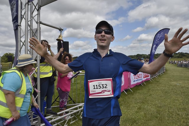 Race for Life 2019 at Ferry Meadows.   First over the line  Chris Martin EMN-190630-170144009