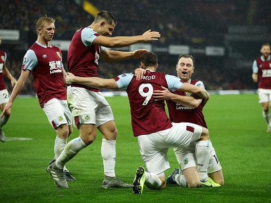 Team spirit and organisation and a couple of decent strikers keep Burnley in the top tier once more