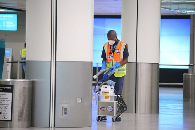 Cleaners in action steam cleaning 

Gatwick Airport's North Terminal before it reopened earlier this month  SUS-200906-105527001