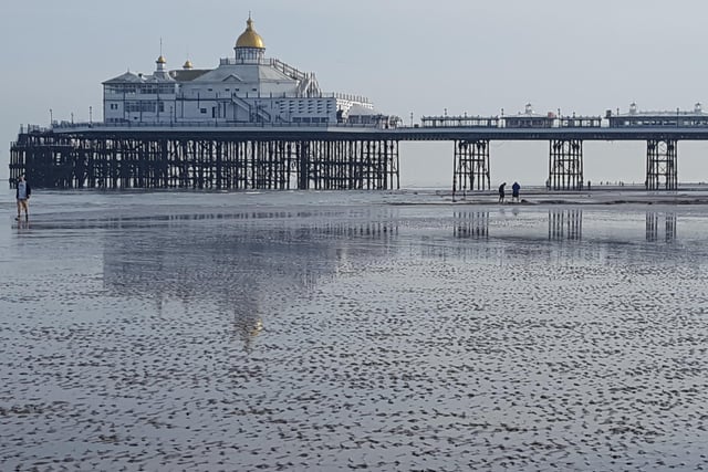 Eastbourne Pier at low tide, taken by Ann Collins with a Samsung S6 smartphone. SUS-200906-141209001