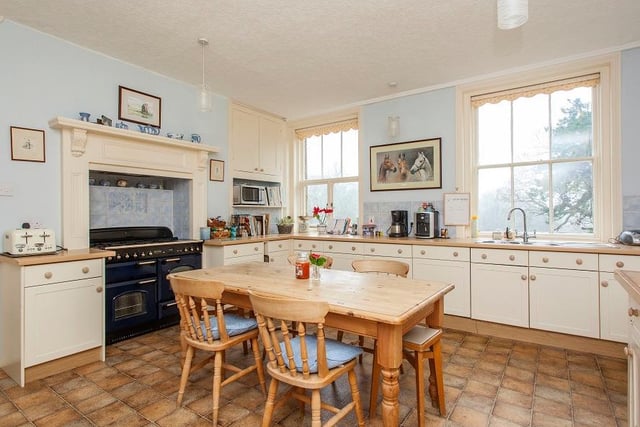 Features include AGA, and large pantry.