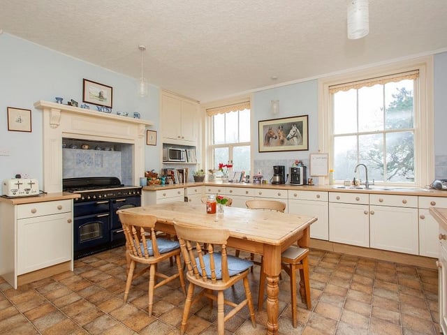 Features include AGA, and large pantry.