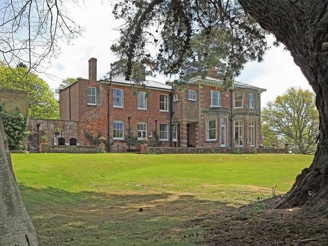 The grounds are split into formal gardens, paddock land and woodland.