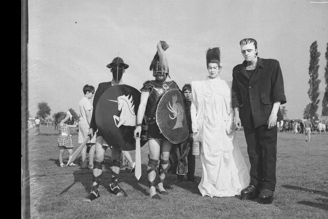 Early carnival participants in armour.