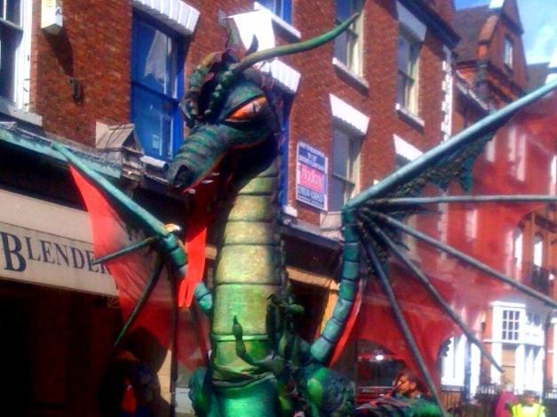 An impressive dragon roaming the streets.