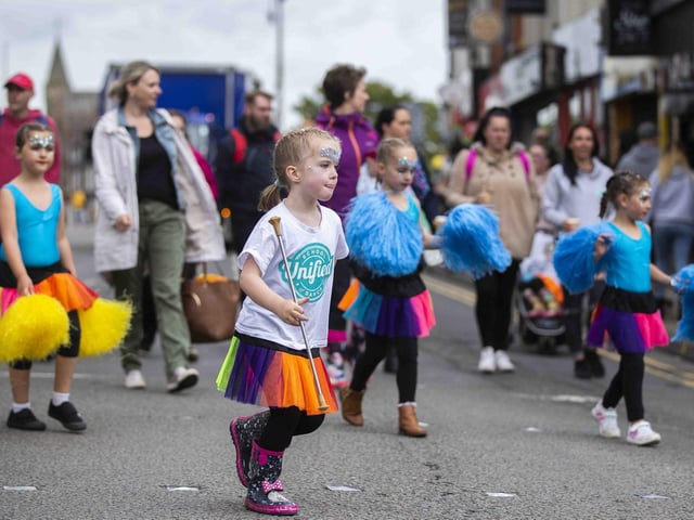 Young majorettes getting involved in the parade.