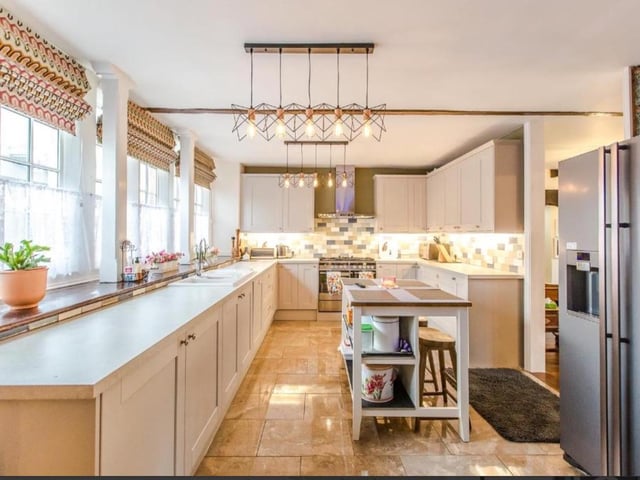 The house has a beautiful kitchen