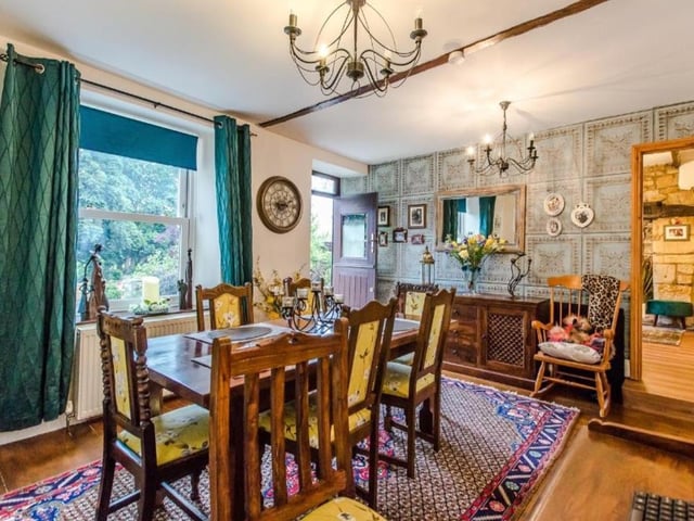 The dining room has original flooring