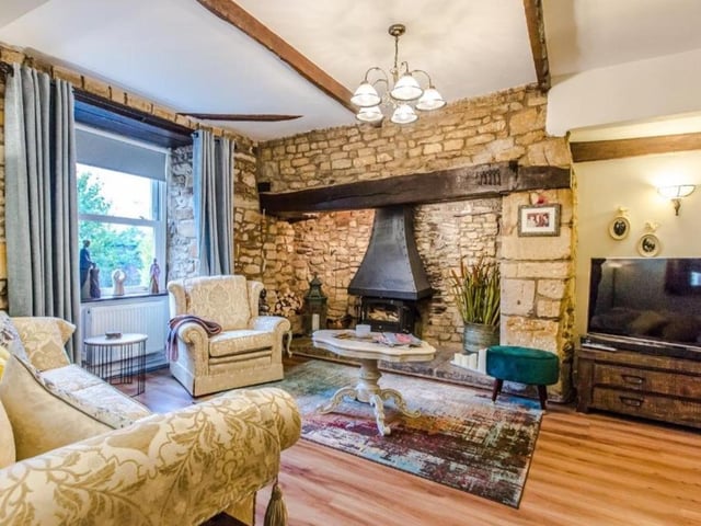 Theres an inglenook fireplace and original beams