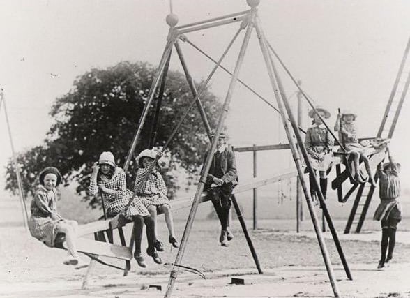 An early swingboat at the park.