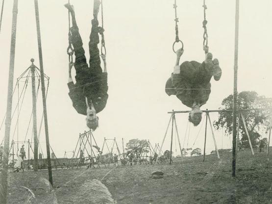 Children hang upside down