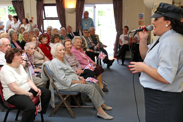 Dame Vera Lynn and Swingtime Sweethearts visit Age UK Day Centre in Horsham. Photo by Derek Martin Photography