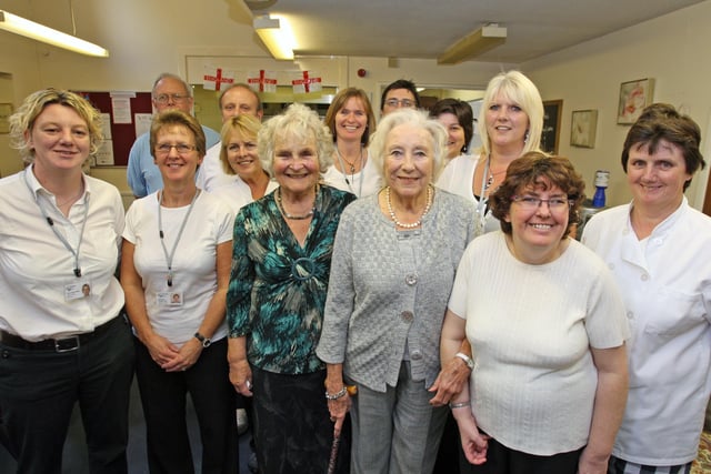 Dame Vera Lynn and Swingtime Sweethearts visit Age UK Day Centre in Horsham. Dame Vera Lynn with centre staff. Photo by Derek Martin Photography