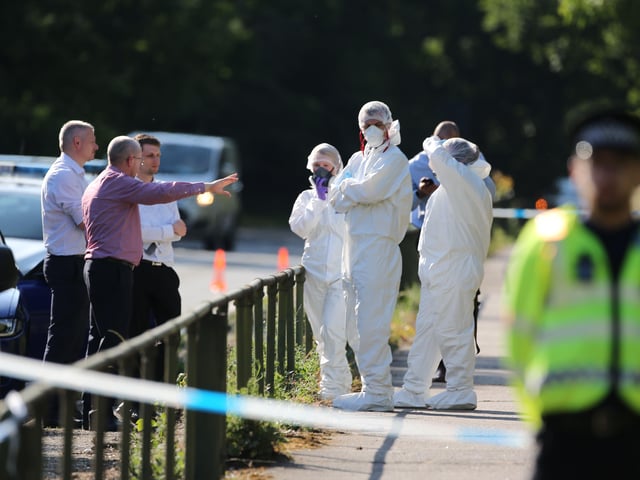 Police investigating the scene