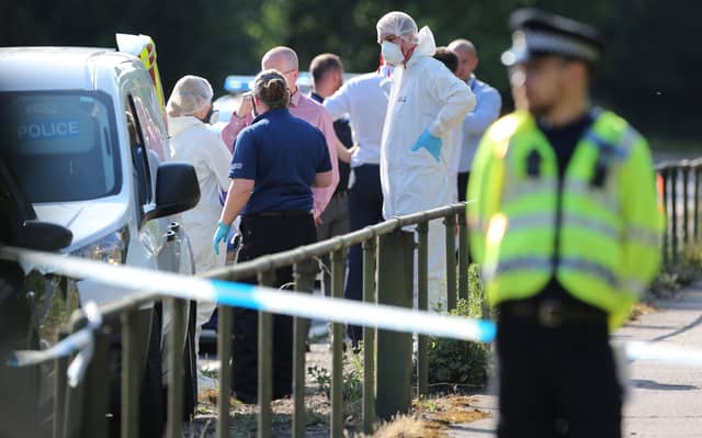 Police investigating the scene