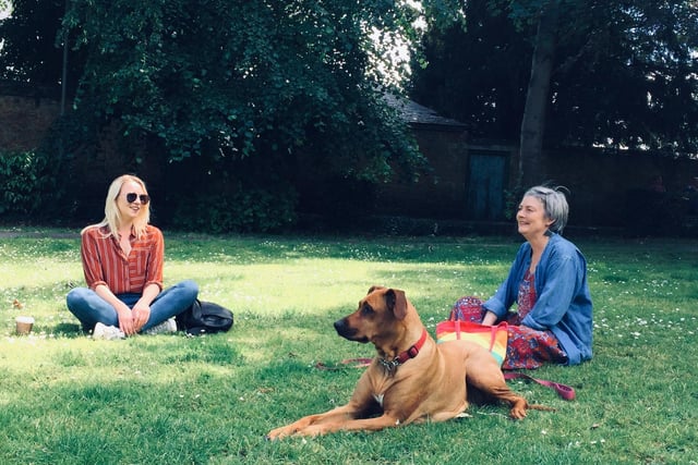 Mother and daughter, Claire and MaryBell, with their dog, Flow, enjoying a socially distance time sitting on the grass at the park inBanbury.(photo byTila Rodriguez Past)