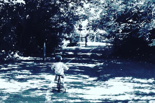 Four year old Milo cycles down a Banbury road (photo byTila Rodriguez Past)